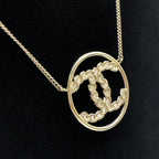 Gold Tone CC Circle Pendant Necklace