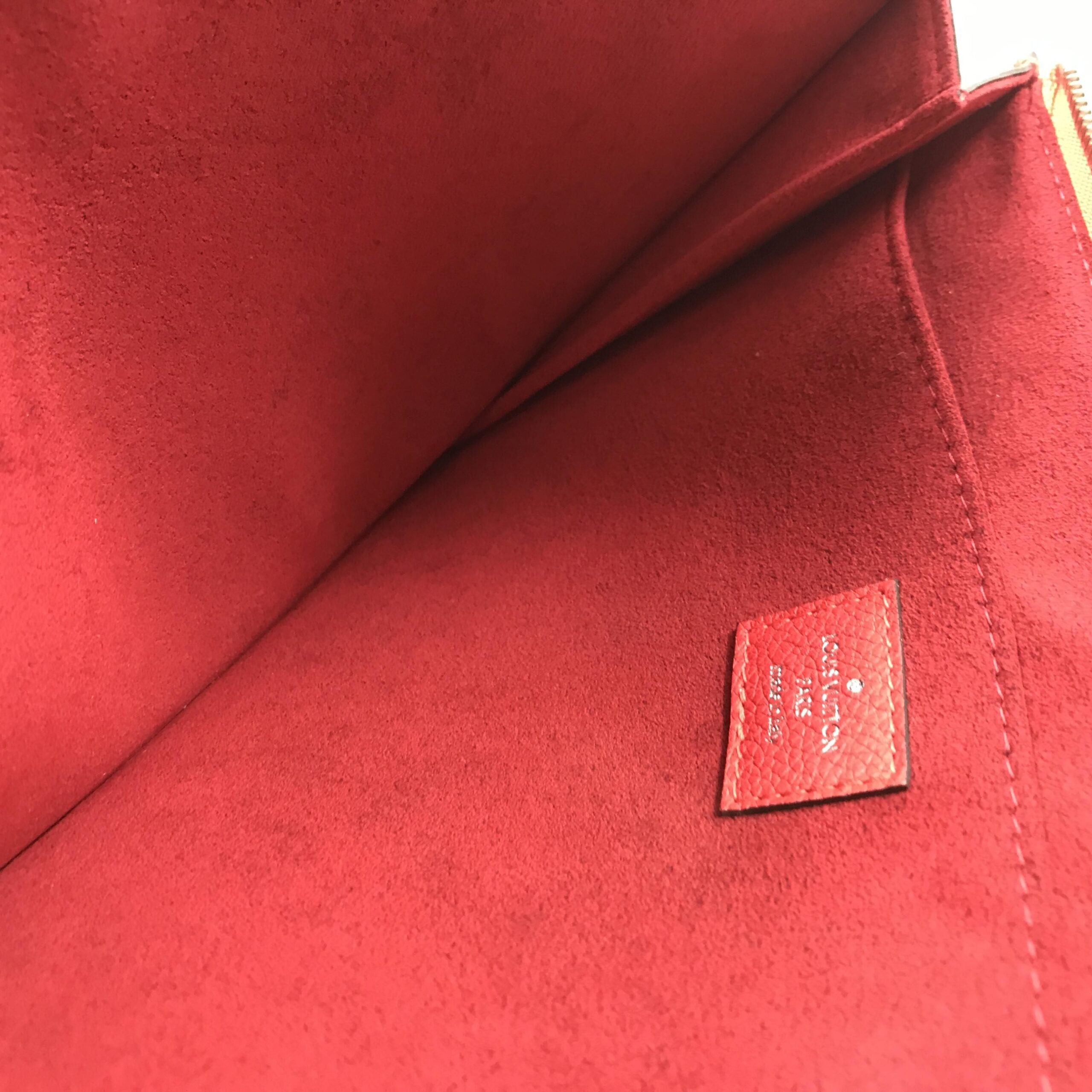 Pochette Joule PM Taurillon Leather Clutch Bag