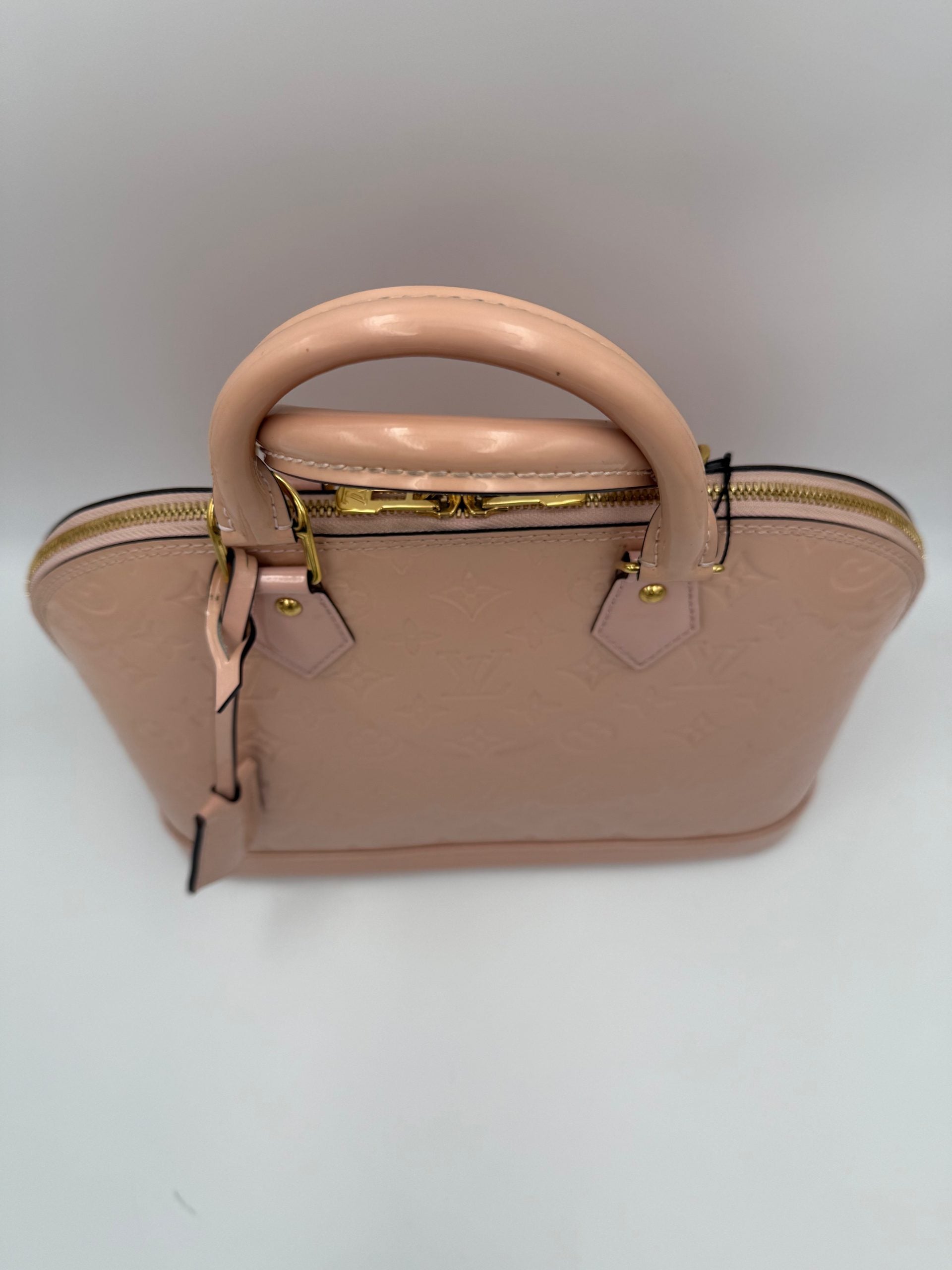 LOUIS VUITTON Alma MM Pink Patent Monogram Handbag