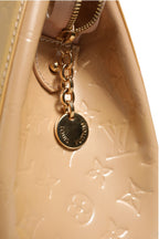 Monogram Vernis Brea MM Beige Poudre