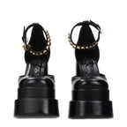 Black Leather Platform Pumps