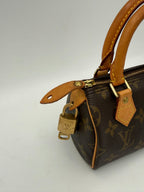 LOUIS VUITTON Nano Speedy Monogram Handbag
