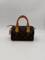 LOUIS VUITTON Nano Speedy Monogram Handbag