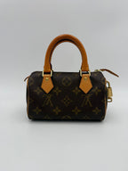 LOUIS VUITTON Nano Speedy Monogram Handbag