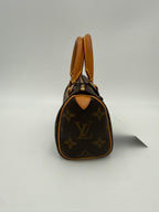 LOUIS VUITTON Nano Speedy Monogram Handbag