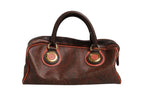 Pattern red, brown, gold canvas duffel bag