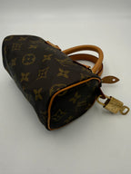 LOUIS VUITTON Nano Speedy Monogram Handbag