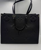 LOUIS VUITTON ON THE GO Empreinte GM Handbag