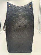 LOUIS VUITTON ON THE GO Empreinte GM Handbag